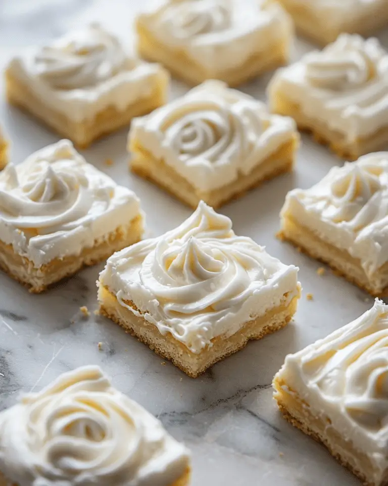 Soft and Buttery Frosted Sugar Cookie Bars with Classic Vanilla Flavor
